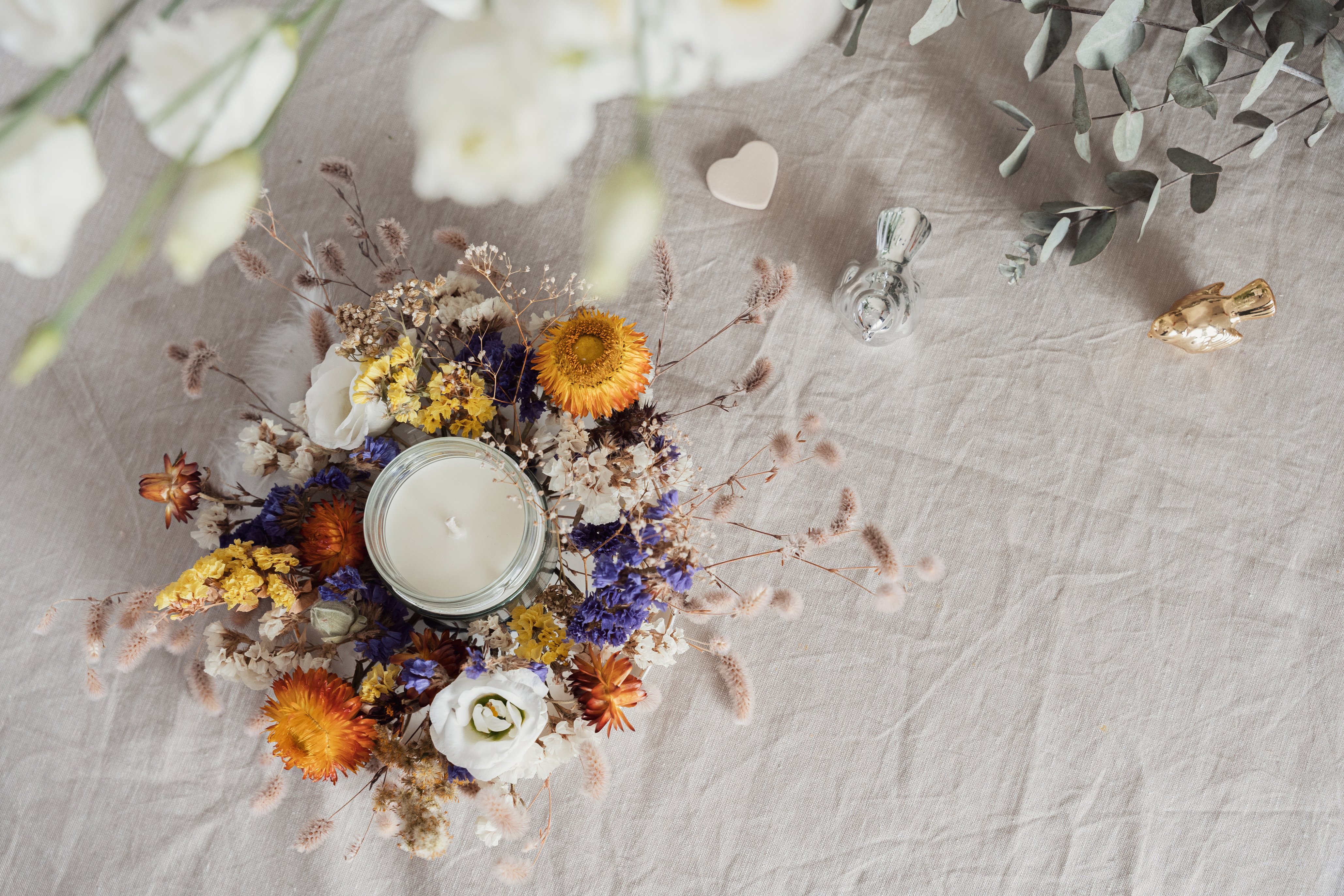 Flat lay with white flowers and Easter decorations, spring aesthetic, copy space